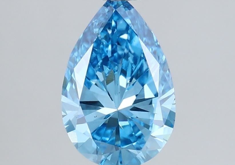 Loose Diamond - PEAR 1.0ct Fancy Vivid Blue VS2: Loose Diamond - PEAR 1.0ct Fancy Vivid Blue VS2 Source: This is a real non-mined Diamond that has been grown in a lab Shape: PEAR Carats: 1.0 Color: Fancy Vivid Blue Certification: IGI Video: