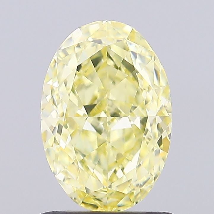 Loose Diamond - OVAL 1.47ct Fancy Yellow VVS2: Loose Diamond - OVAL 1.47ct Fancy Yellow VVS2 Source: This is a real non-mined Diamond that has been grown in a lab Shape: OVAL Carats: 1.47 Color: Fancy Yellow Certification: IGI Video: