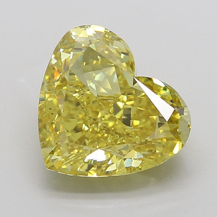 Loose Diamond - HEART 9.08ct Fancy Vivid Yellow VS2: Loose Diamond - HEART 9.08ct Fancy Vivid Yellow VS2 Source: This is a real non-mined Diamond that has been grown in a lab Shape: HEART Carats: 9.08 Color: Fancy Vivid Yellow Certification: IGI Video: