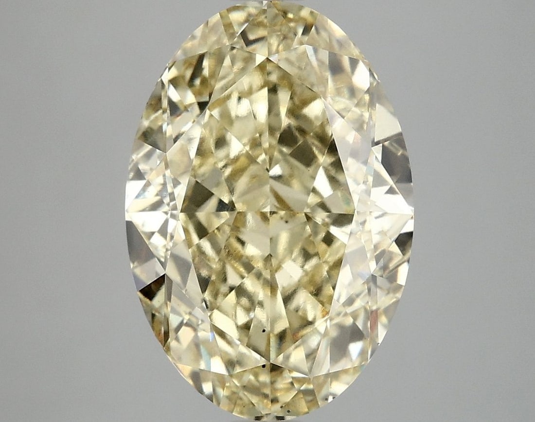 Loose Diamond - OVAL 6.06ct Fancy Vivid Yellow VS2: Loose Diamond - OVAL 6.06ct Fancy Vivid Yellow VS2 Source: This is a real non-mined Diamond that has been grown in a lab Shape: OVAL Carats: 6.06 Color: Fancy Vivid Yellow Certification: IGI Video: