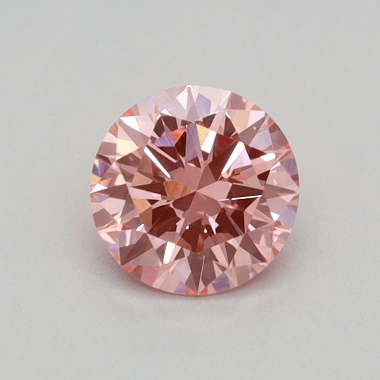 Loose Diamond - ROUND 0.33ct Fancy Vivid Pink VVS2: Loose Diamond - ROUND 0.33ct Fancy Vivid Pink VVS2 Source: This is a real non-mined Diamond that has been grown in a lab Shape: ROUND Carats: 0.33 Color: Fancy Vivid Pink Certification: IGI Video:
