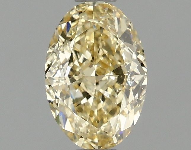 Loose Diamond - OVAL 1.06ct Fancy Intense Yellow VVS2: Loose Diamond - OVAL 1.06ct Fancy Intense Yellow VVS2 Source: This is a real non-mined Diamond that has been grown in a lab Shape: OVAL Carats: 1.06 Color: Fancy Intense Yellow Certification: IGI Vide