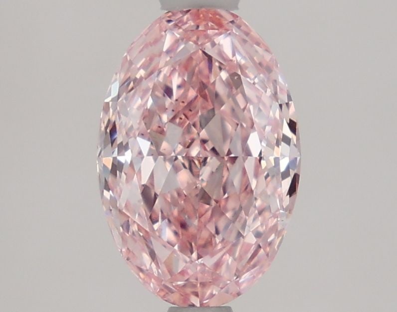 Loose Diamond - OVAL 1.71ct Fancy Vivid Pink VS1: Loose Diamond - OVAL 1.71ct Fancy Vivid Pink VS1 Source: This is a real non-mined Diamond that has been grown in a lab Shape: OVAL Carats: 1.71 Color: Fancy Vivid Pink Certification: IGI Video: