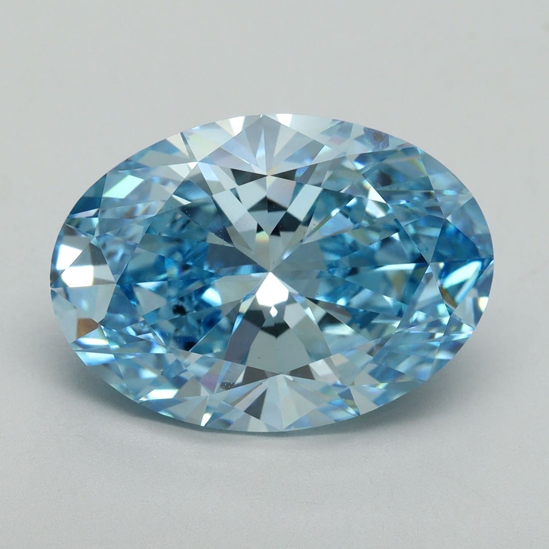 Loose Diamond - OVAL 8.7ct Fancy Vivid Blue SI1: Loose Diamond - OVAL 8.7ct Fancy Vivid Blue SI1 Source: This is a real non-mined Diamond that has been grown in a lab Shape: OVAL Carats: 8.7 Color: Fancy Vivid Blue Certification: IGI Video: