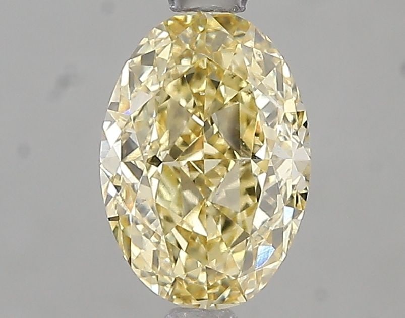 Loose Diamond - OVAL 1.59ct Fancy Intense Yellow VS2: Loose Diamond - OVAL 1.59ct Fancy Intense Yellow VS2 Source: This is a real non-mined Diamond that has been grown in a lab Shape: OVAL Carats: 1.59 Color: Fancy Intense Yellow Certification: IGI Video