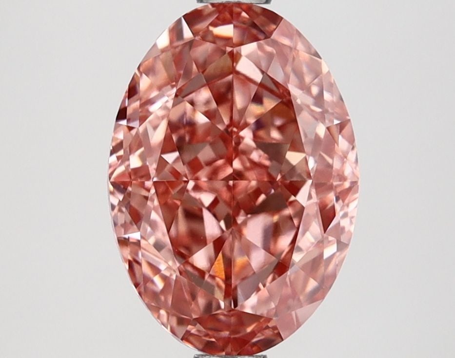 Loose Diamond - OVAL 2.57ct Fancy Vivid Pink VVS2: Loose Diamond - OVAL 2.57ct Fancy Vivid Pink VVS2 Source: This is a real non-mined Diamond that has been grown in a lab Shape: OVAL Carats: 2.57 Color: Fancy Vivid Pink Certification: IGI Video: