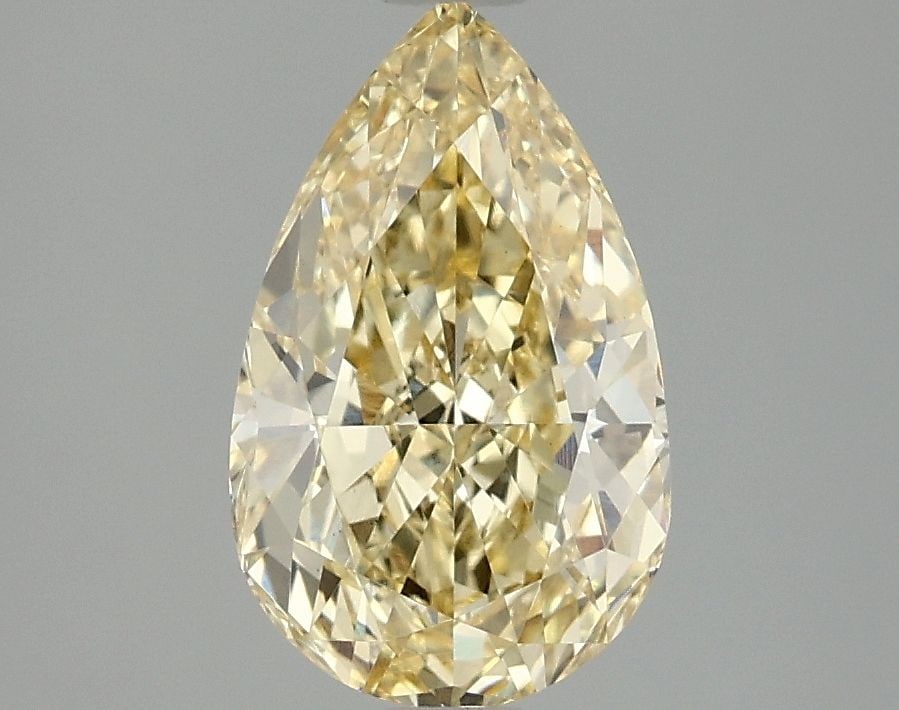Loose Diamond - PEAR 2.04ct Fancy Vivid Yellow VS1: Loose Diamond - PEAR 2.04ct Fancy Vivid Yellow VS1 Source: This is a real non-mined Diamond that has been grown in a lab Shape: PEAR Carats: 2.04 Color: Fancy Vivid Yellow Certification: IGI Video: