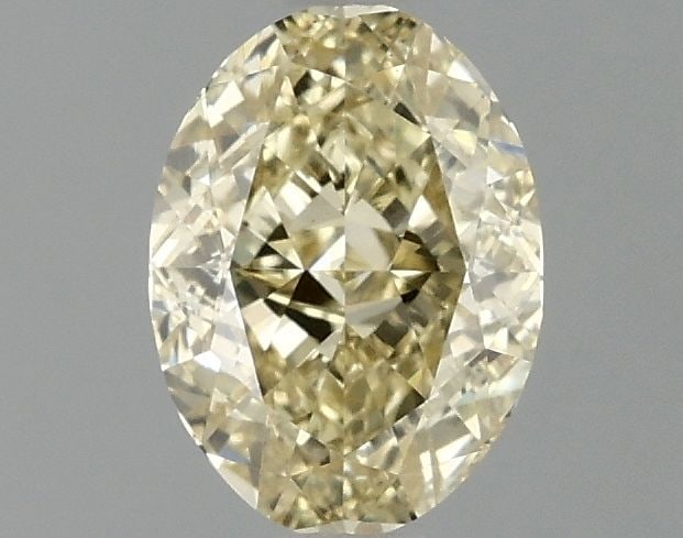Loose Diamond - OVAL 1.04ct Fancy Vivid Yellow VS1: Loose Diamond - OVAL 1.04ct Fancy Vivid Yellow VS1 Source: This is a real non-mined Diamond that has been grown in a lab Shape: OVAL Carats: 1.04 Color: Fancy Vivid Yellow Certification: IGI Video: