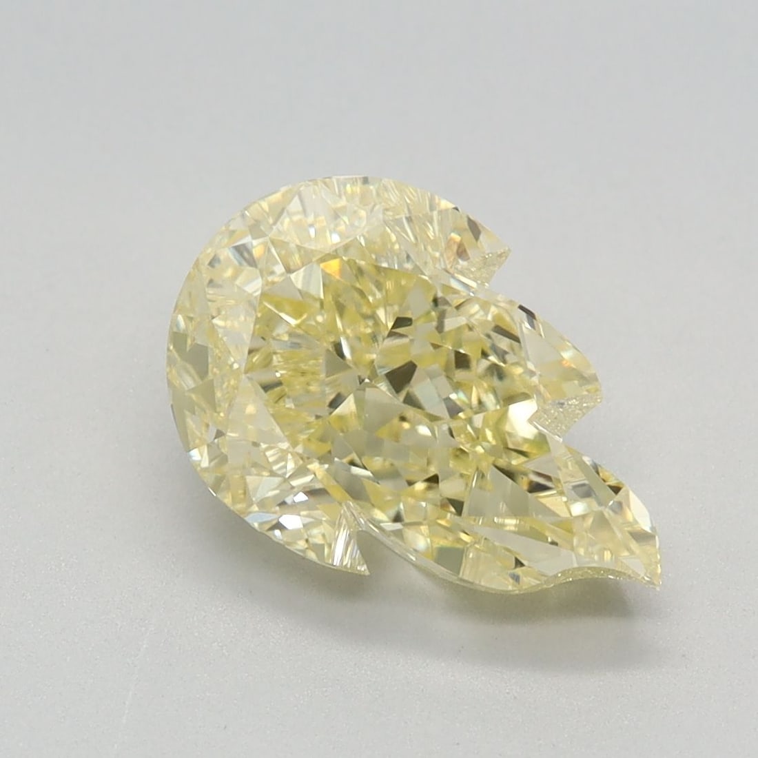 Loose Diamond - OTHER 2.34ct Fancy Intense Yellow VVS2: Loose Diamond - OTHER 2.34ct Fancy Intense Yellow VVS2 Source: This is a real non-mined Diamond that has been grown in a lab Shape: OTHER Carats: 2.34 Color: Fancy Intense Yellow Certification: IGI Vi