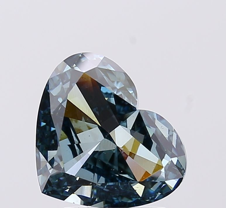 Loose Diamond - HEART 3.12ct Fancy Vivid Green Blue VS2: Loose Diamond - HEART 3.12ct Fancy Vivid Green Blue VS2 Source: This is a real non-mined Diamond that has been grown in a lab Shape: HEART Carats: 3.12 Color: Fancy Vivid Green Blue Certification: IGI