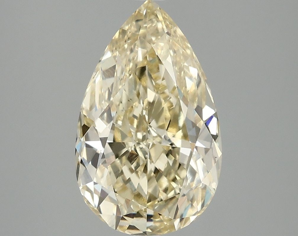 Loose Diamond - PEAR 3.03ct Fancy Vivid Yellow VS1: Loose Diamond - PEAR 3.03ct Fancy Vivid Yellow VS1 Source: This is a real non-mined Diamond that has been grown in a lab Shape: PEAR Carats: 3.03 Color: Fancy Vivid Yellow Certification: IGI Video: