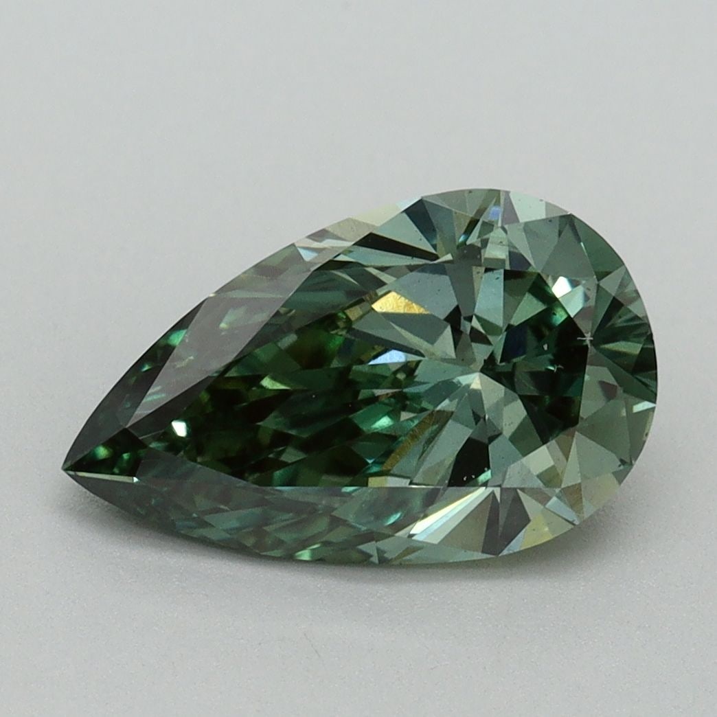 Loose Diamond - PEAR 2.01ct Fancy Vivid Green VS2: Loose Diamond - PEAR 2.01ct Fancy Vivid Green VS2 Source: This is a real non-mined Diamond that has been grown in a lab Shape: PEAR Carats: 2.01 Color: Fancy Vivid Green Certification: IGI Video: