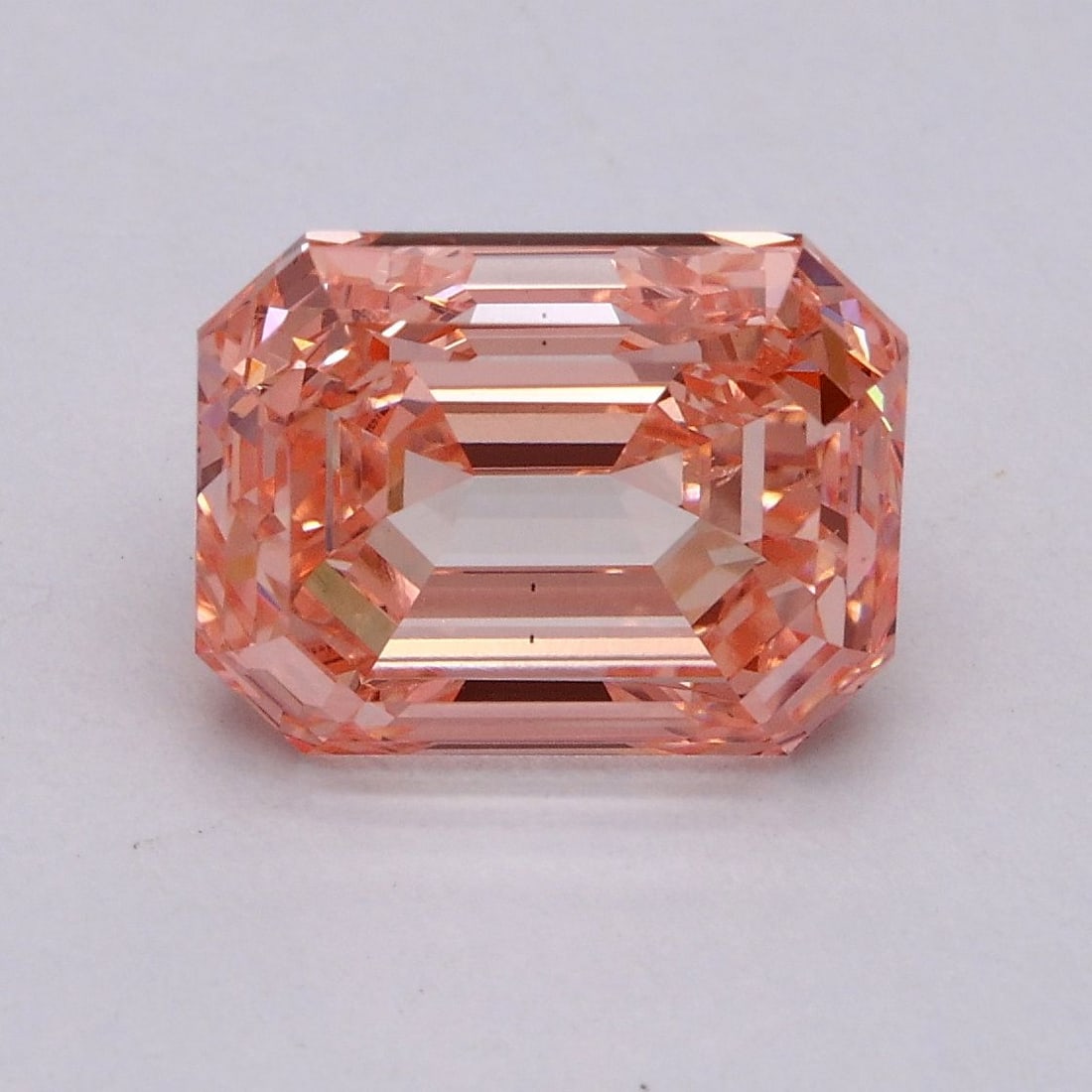 Loose Diamond - EMERALD 3.02ct Fancy Vivid Pink VS2: Loose Diamond - EMERALD 3.02ct Fancy Vivid Pink VS2 Source: This is a real non-mined Diamond that has been grown in a lab Shape: EMERALD Carats: 3.02 Color: Fancy Vivid Pink Certification: IGI Video: