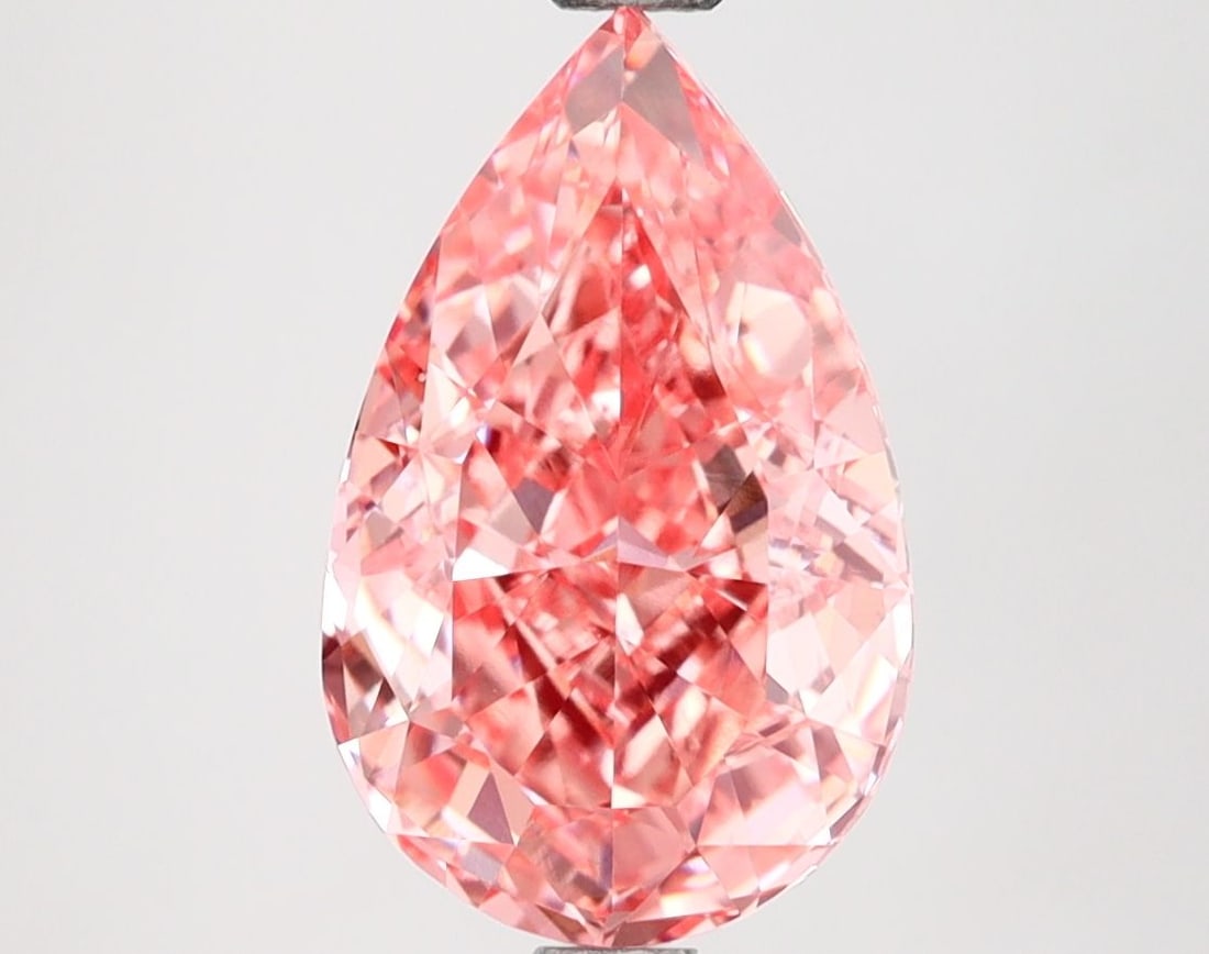 Loose Diamond - PEAR 3.0ct Fancy Vivid Pink VS1: Loose Diamond - PEAR 3.0ct Fancy Vivid Pink VS1 Source: This is a real non-mined Diamond that has been grown in a lab Shape: PEAR Carats: 3.0 Color: Fancy Vivid Pink Certification: IGI Video: