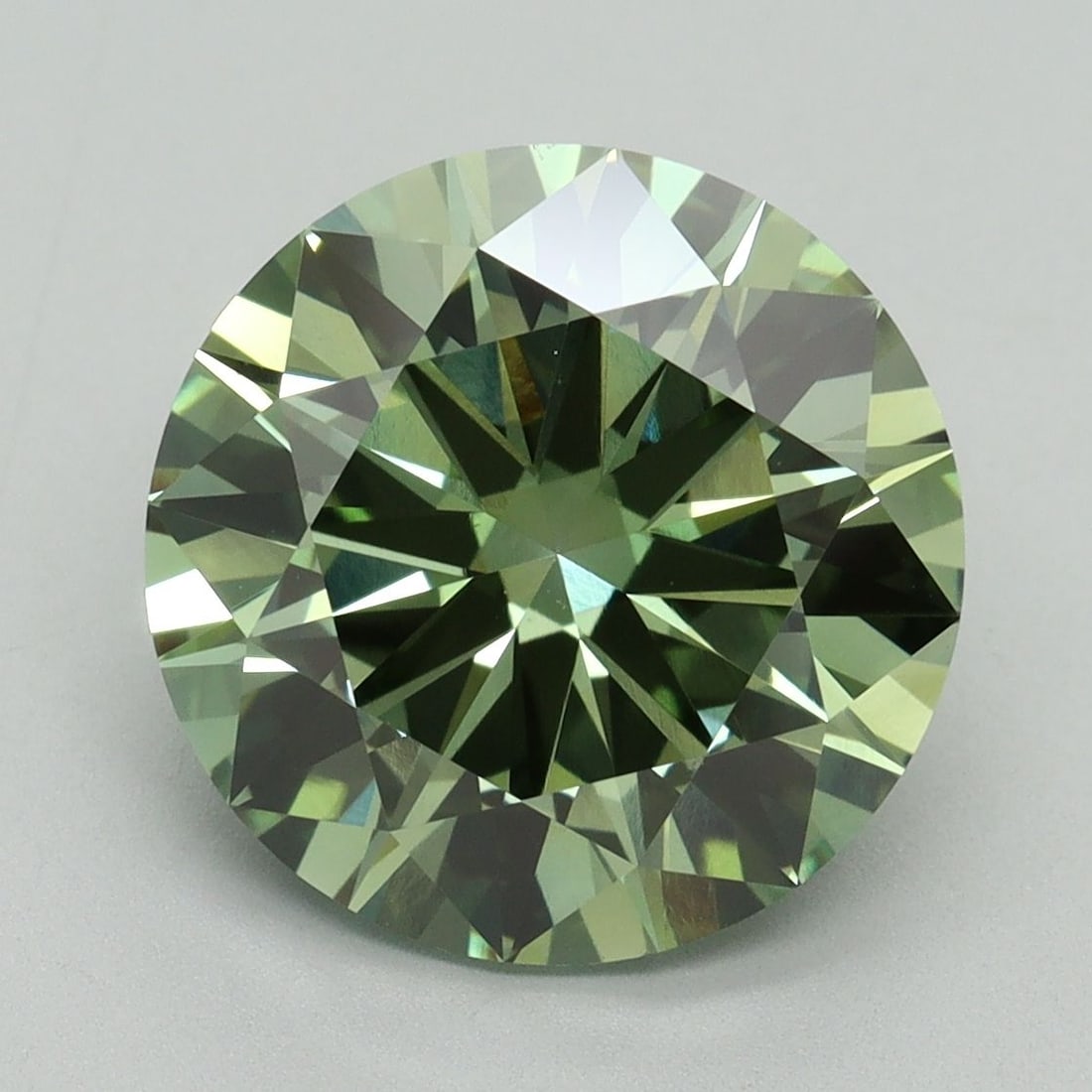 Loose Diamond - ROUND 5.12ct Fancy Vivid Green VS1: Loose Diamond - ROUND 5.12ct Fancy Vivid Green VS1 Source: This is a real non-mined Diamond that has been grown in a lab Shape: ROUND Carats: 5.12 Color: Fancy Vivid Green Certification: IGI Video: