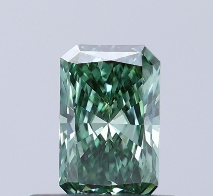 Loose Diamond - RADIANT 0.38ct Fancy Vivid Green VS1: Loose Diamond - RADIANT 0.38ct Fancy Vivid Green VS1 Source: This is a real non-mined Diamond that has been grown in a lab Shape: RADIANT Carats: 0.38 Color: Fancy Vivid Green Certification: IGI Video
