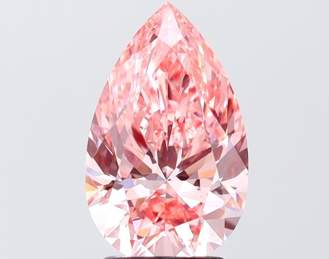 Loose Diamond - PEAR 3.01ct Fancy Vivid Pink VS2: Loose Diamond - PEAR 3.01ct Fancy Vivid Pink VS2 Source: This is a real non-mined Diamond that has been grown in a lab Shape: PEAR Carats: 3.01 Color: Fancy Vivid Pink Certification: IGI Video:
