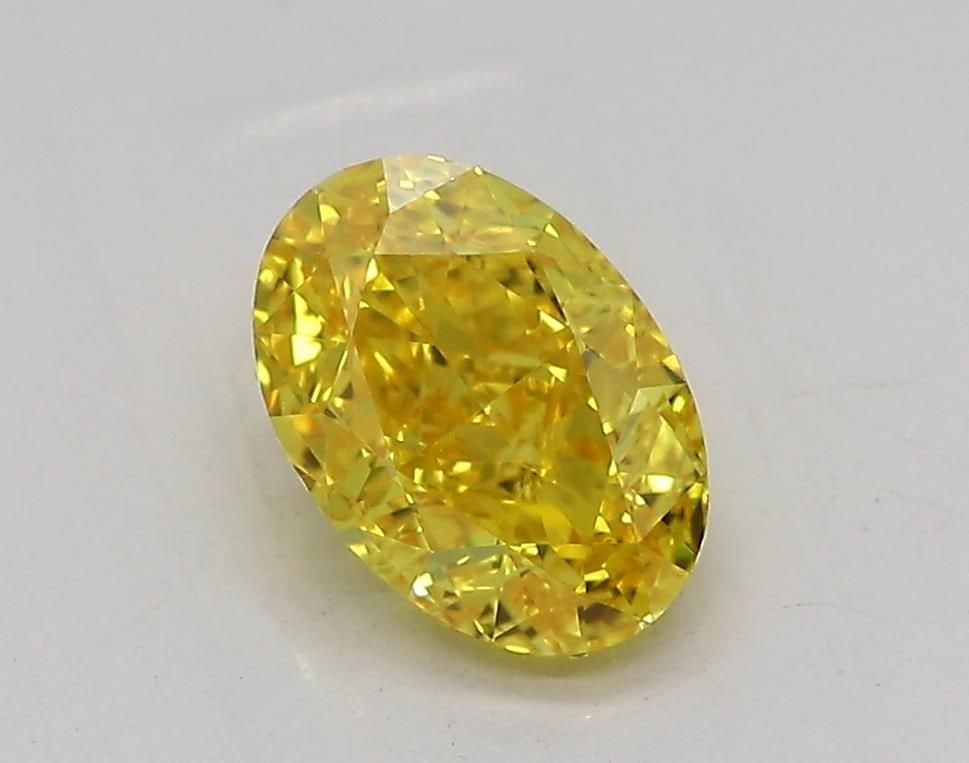 Loose Diamond - OVAL 1.02ct Fancy Vivid Yellow VS1: Loose Diamond - OVAL 1.02ct Fancy Vivid Yellow VS1 Source: This is a real non-mined Diamond that has been grown in a lab Shape: OVAL Carats: 1.02 Color: Fancy Vivid Yellow Certification: IGI Video:
