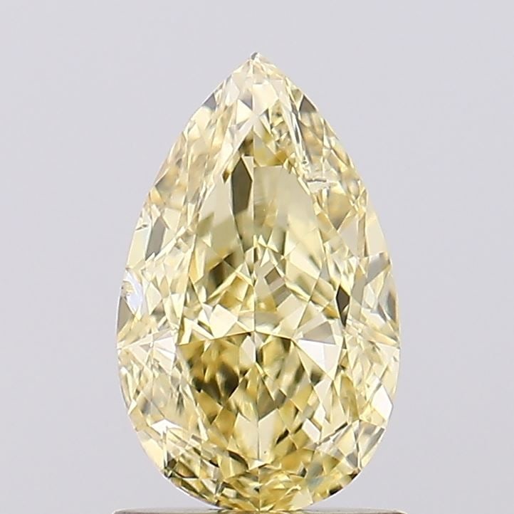 Loose Diamond - PEAR 1.3ct Fancy Yellow VS2: Loose Diamond - PEAR 1.3ct Fancy Yellow VS2 Source: This is a real non-mined Diamond that has been grown in a lab Shape: PEAR Carats: 1.3 Color: Fancy Yellow Certification: IGI Video: