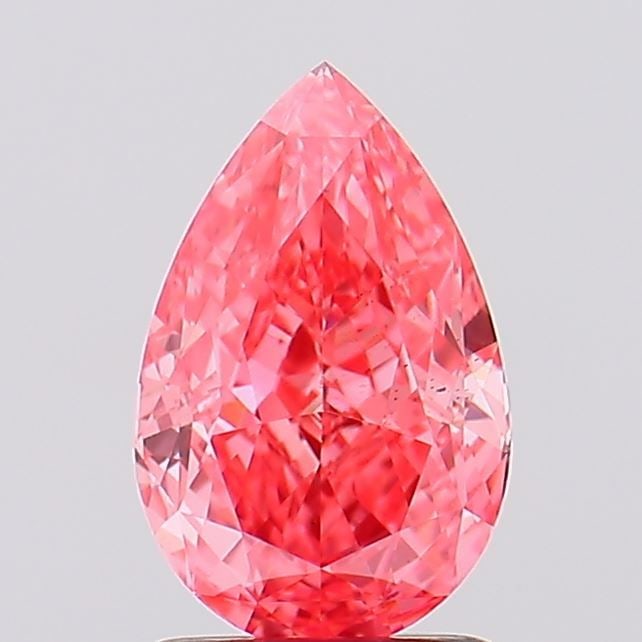 Loose Diamond - PEAR 1.74ct Fancy Vivid Pink VS2: Loose Diamond - PEAR 1.74ct Fancy Vivid Pink VS2 Source: This is a real non-mined Diamond that has been grown in a lab Shape: PEAR Carats: 1.74 Color: Fancy Vivid Pink Certification: IGI Video: