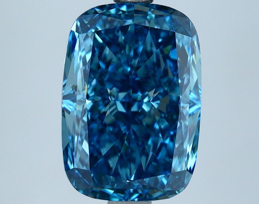 Loose Diamond - CUSHION MODIFIED 3.51ct Fancy Vivid Blue VS1: Loose Diamond - CUSHION MODIFIED 3.51ct Fancy Vivid Blue VS1 Source: This is a real non-mined Diamond that has been grown in a lab Shape: CUSHION MODIFIED Carats: 3.51 Color: Fancy Vivid Blue Certific