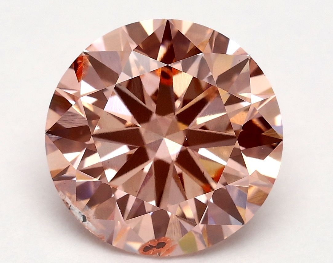 Loose Diamond - ROUND 3.0ct Fancy Vivid Pink SI2: Loose Diamond - ROUND 3.0ct Fancy Vivid Pink SI2 Source: This is a real non-mined Diamond that has been grown in a lab Shape: ROUND Carats: 3.0 Color: Fancy Vivid Pink Certification: IGI Video: