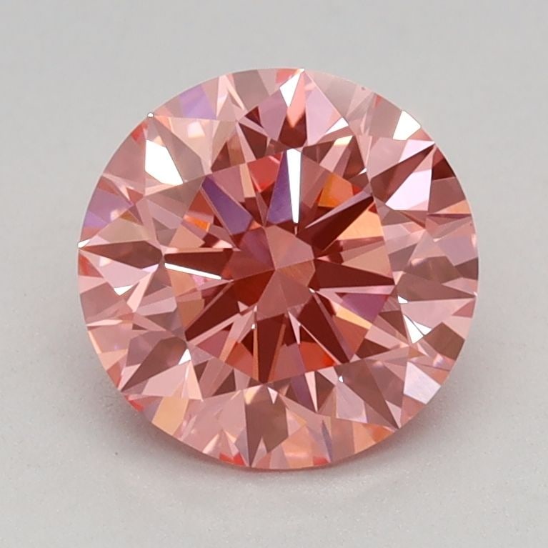 Ideal Loose Diamond - ROUND 1.11ct Fancy Vivid Pink VS1: Ideal Loose Diamond - ROUND 1.11ct Fancy Vivid Pink VS1 Source: This is a real non-mined Diamond that has been grown in a lab Shape: ROUND Carats: 1.11 Color: Fancy Vivid Pink Certification: IGI Video