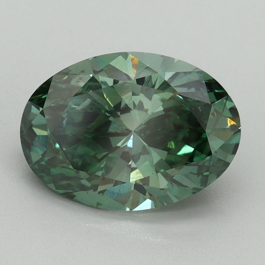 Loose Diamond - OVAL 2.94ct Fancy Vivid Green VS2: Loose Diamond - OVAL 2.94ct Fancy Vivid Green VS2 Source: This is a real non-mined Diamond that has been grown in a lab Shape: OVAL Carats: 2.94 Color: Fancy Vivid Green Certification: IGI Video: