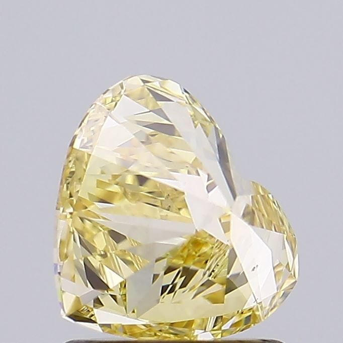 Loose Diamond - HEART 1.13ct Fancy Yellow VS2: Loose Diamond - HEART 1.13ct Fancy Yellow VS2 Source: This is a real non-mined Diamond that has been grown in a lab Shape: HEART Carats: 1.13 Color: Fancy Yellow Certification: IGI Video: