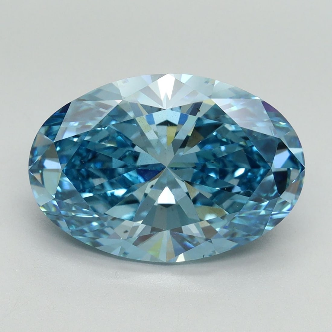 Loose Diamond - OVAL 5.12ct Fancy Vivid Blue VS2: Loose Diamond - OVAL 5.12ct Fancy Vivid Blue VS2 Source: This is a real non-mined Diamond that has been grown in a lab Shape: OVAL Carats: 5.12 Color: Fancy Vivid Blue Certification: IGI Video: