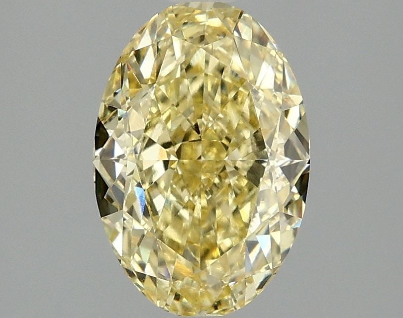 Loose Diamond - OVAL 2.1ct Fancy Intense Yellow VS1: Loose Diamond - OVAL 2.1ct Fancy Intense Yellow VS1 Source: This is a real non-mined Diamond that has been grown in a lab Shape: OVAL Carats: 2.1 Color: Fancy Intense Yellow Certification: IGI Video: