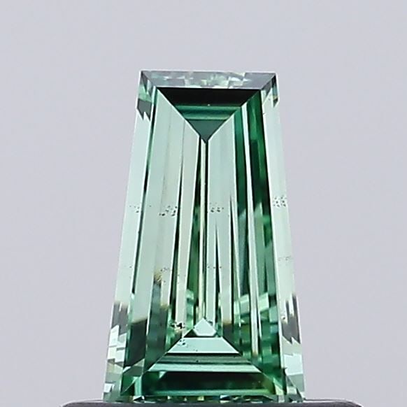 Loose Diamond - TAPERED BAGUETTE 0.34ct Fancy Vivid Green VS2: Loose Diamond - TAPERED BAGUETTE 0.34ct Fancy Vivid Green VS2 Source: This is a real non-mined Diamond that has been grown in a lab Shape: TAPERED BAGUETTE Carats: 0.34 Color: Fancy Vivid Green Certif