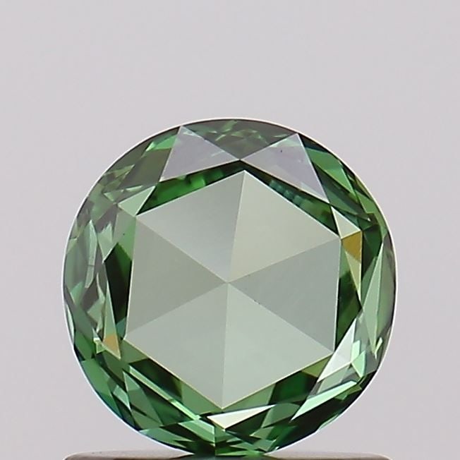 Loose Diamond - ROSE 0.65ct Fancy Vivid Green VS1: Loose Diamond - ROSE 0.65ct Fancy Vivid Green VS1 Source: This is a real non-mined Diamond that has been grown in a lab Shape: ROSE Carats: 0.65 Color: Fancy Vivid Green Certification: NONE Video: