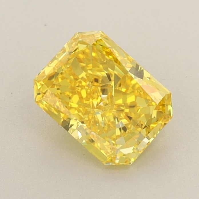 Loose Diamond - RADIANT 0.81ct Fancy Vivid Yellow VVS2: Loose Diamond - RADIANT 0.81ct Fancy Vivid Yellow VVS2 Source: This is a real non-mined Diamond that has been grown in a lab Shape: RADIANT Carats: 0.81 Color: Fancy Vivid Yellow Certification: IGI Vi