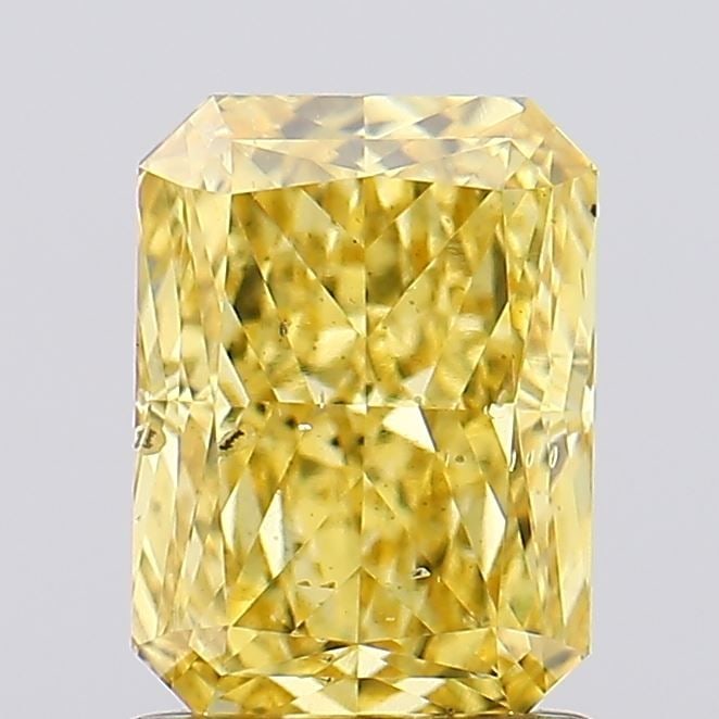 Loose Diamond - RADIANT 1.31ct Fancy Vivid Yellow SI1: Loose Diamond - RADIANT 1.31ct Fancy Vivid Yellow SI1 Source: This is a real non-mined Diamond that has been grown in a lab Shape: RADIANT Carats: 1.31 Color: Fancy Vivid Yellow Certification: IGI Vid