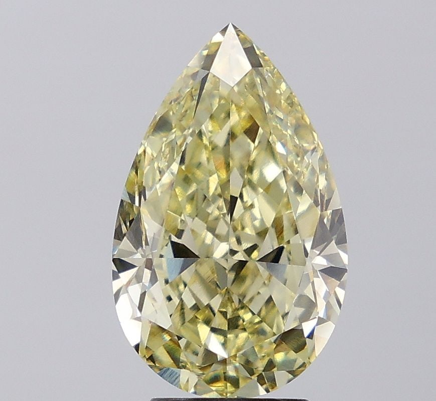Loose Diamond - PEAR 5.1ct Fancy Yellow VS2: Loose Diamond - PEAR 5.1ct Fancy Yellow VS2 Source: This is a real non-mined Diamond that has been grown in a lab Shape: PEAR Carats: 5.1 Color: Fancy Yellow Certification: IGI Video: