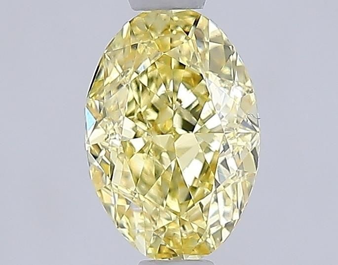 Loose Diamond - OVAL 1.02ct Fancy Yellow VVS2: Loose Diamond - OVAL 1.02ct Fancy Yellow VVS2 Source: This is a real non-mined Diamond that has been grown in a lab Shape: OVAL Carats: 1.02 Color: Fancy Yellow Certification: IGI Video: