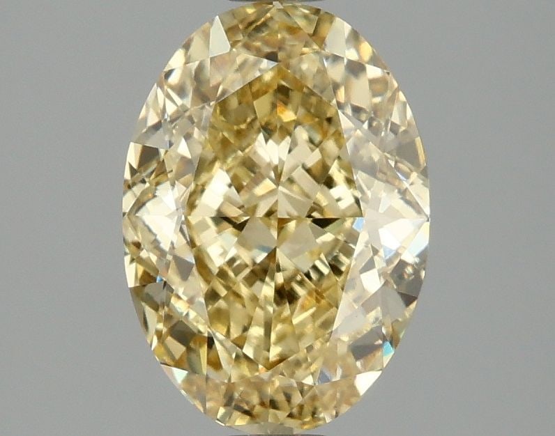 Loose Diamond - OVAL 2.09ct Fancy Vivid Yellow VS1: Loose Diamond - OVAL 2.09ct Fancy Vivid Yellow VS1 Source: This is a real non-mined Diamond that has been grown in a lab Shape: OVAL Carats: 2.09 Color: Fancy Vivid Yellow Certification: IGI Video:
