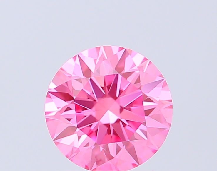 Ideal Loose Diamond - ROUND 0.55ct Fancy Vivid Pink VS1: Ideal Loose Diamond - ROUND 0.55ct Fancy Vivid Pink VS1 Source: This is a real non-mined Diamond that has been grown in a lab Shape: ROUND Carats: 0.55 Color: Fancy Vivid Pink Certification: IGI Video