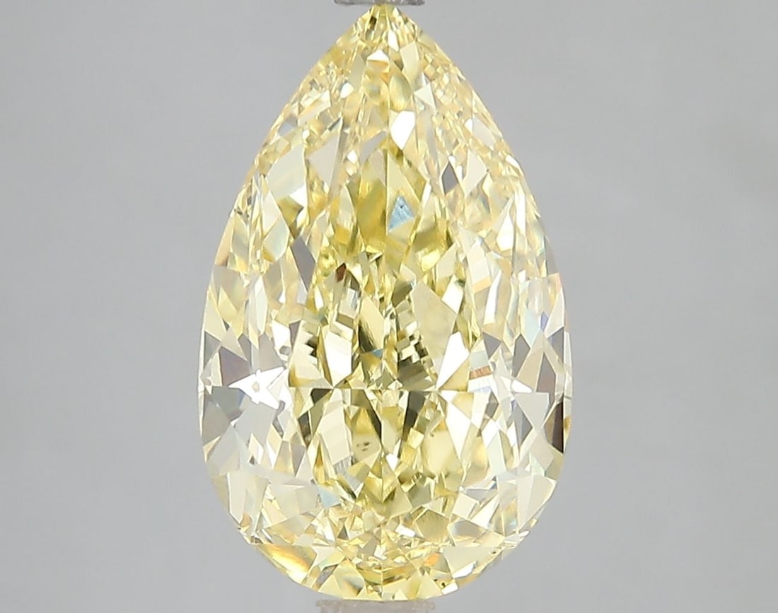 Loose Diamond - PEAR 5.1ct Fancy Vivid Yellow VS1: Loose Diamond - PEAR 5.1ct Fancy Vivid Yellow VS1 Source: This is a real non-mined Diamond that has been grown in a lab Shape: PEAR Carats: 5.1 Color: Fancy Vivid Yellow Certification: IGI Video:
