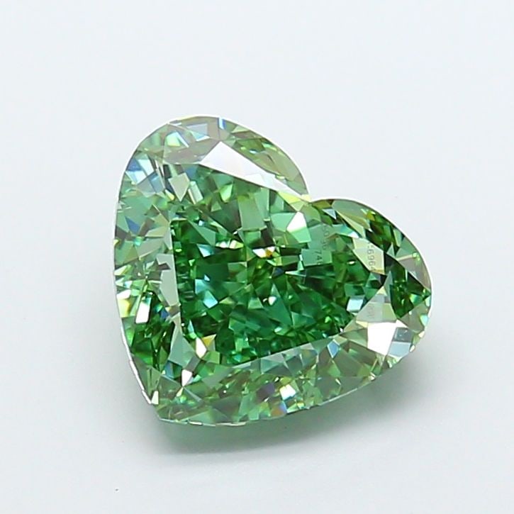 Loose Diamond - HEART 5.04ct Fancy Vivid Green VS1: Loose Diamond - HEART 5.04ct Fancy Vivid Green VS1 Source: This is a real non-mined Diamond that has been grown in a lab Shape: HEART Carats: 5.04 Color: Fancy Vivid Green Certification: IGI Video:
