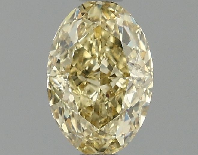Loose Diamond - OVAL 1.07ct Fancy Vivid Yellow VS1: Loose Diamond - OVAL 1.07ct Fancy Vivid Yellow VS1 Source: This is a real non-mined Diamond that has been grown in a lab Shape: OVAL Carats: 1.07 Color: Fancy Vivid Yellow Certification: IGI Video: