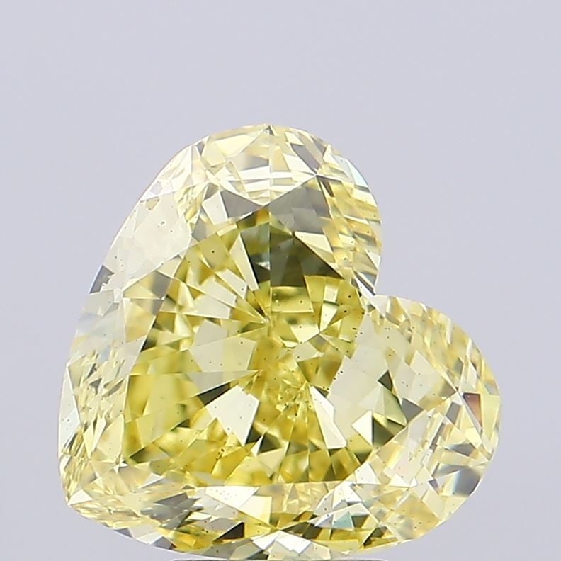 Loose Diamond - HEART 5.16ct Fancy Yellow VS2: Loose Diamond - HEART 5.16ct Fancy Yellow VS2 Source: This is a real non-mined Diamond that has been grown in a lab Shape: HEART Carats: 5.16 Color: Fancy Yellow Certification: IGI Video: