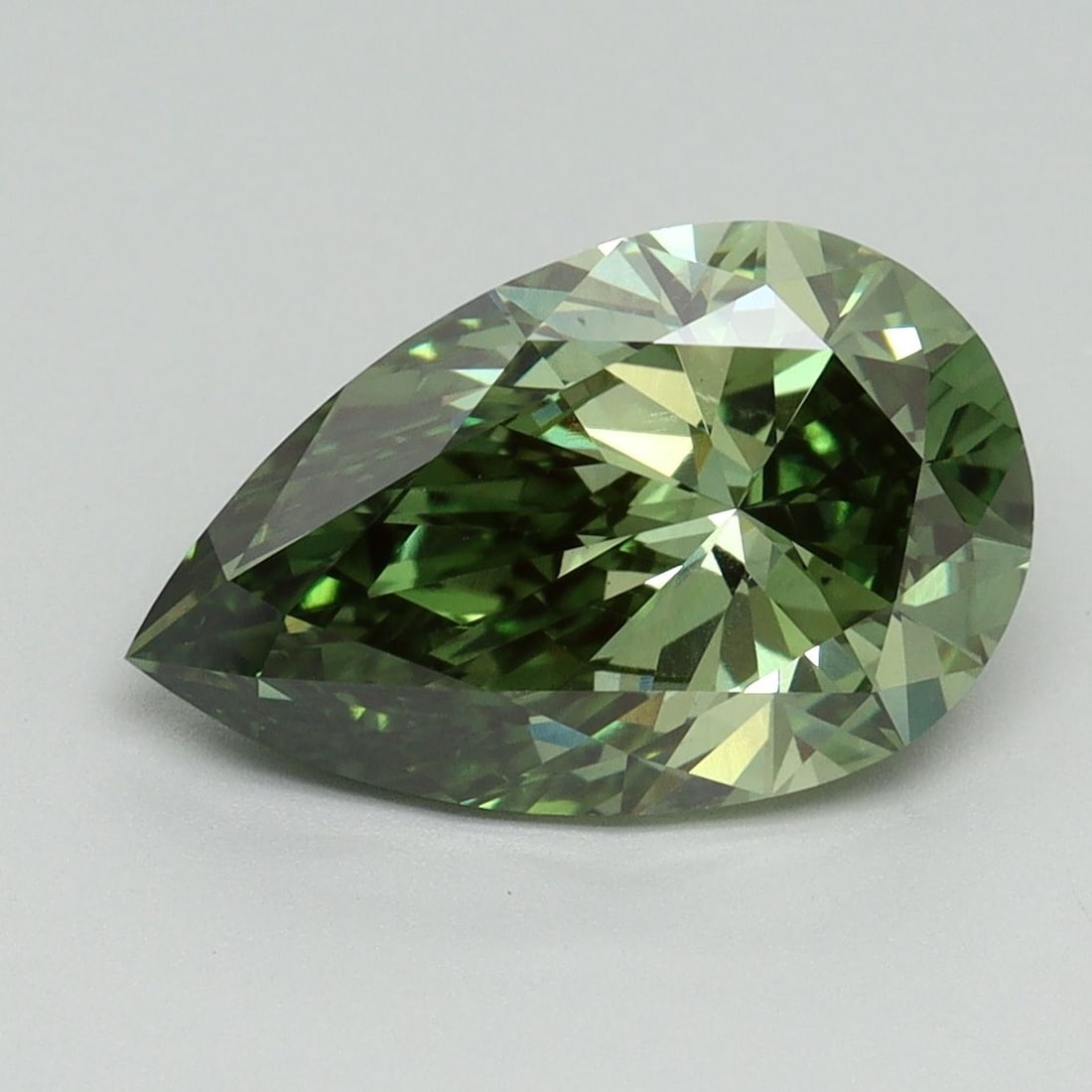 Loose Diamond - PEAR 3.03ct Fancy Vivid Green VS2: Loose Diamond - PEAR 3.03ct Fancy Vivid Green VS2 Source: This is a real non-mined Diamond that has been grown in a lab Shape: PEAR Carats: 3.03 Color: Fancy Vivid Green Certification: IGI Video: