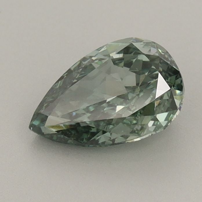 Loose Diamond - PEAR 0.91ct Fancy Vivid Green VVS2: Loose Diamond - PEAR 0.91ct Fancy Vivid Green VVS2 Source: This is a real non-mined Diamond that has been grown in a lab Shape: PEAR Carats: 0.91 Color: Fancy Vivid Green Certification: IGI Video: