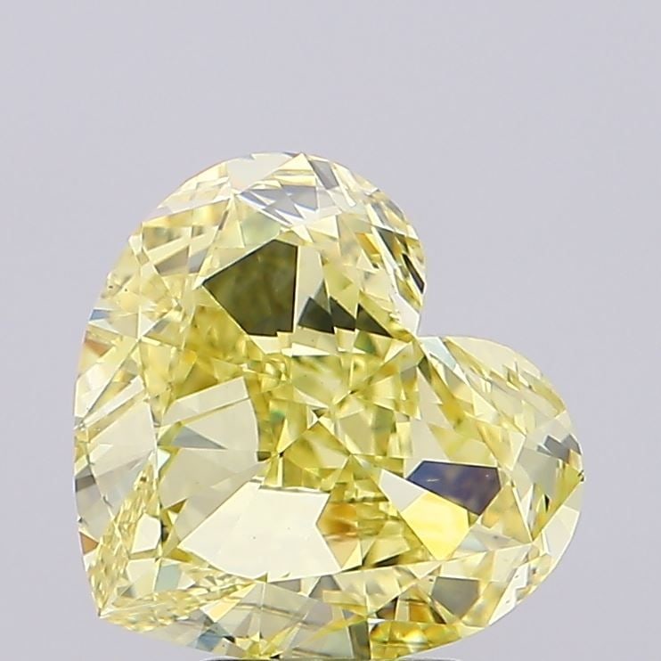 Loose Diamond - HEART 5.89ct Fancy Yellow VS2: Loose Diamond - HEART 5.89ct Fancy Yellow VS2 Source: This is a real non-mined Diamond that has been grown in a lab Shape: HEART Carats: 5.89 Color: Fancy Yellow Certification: IGI Video: