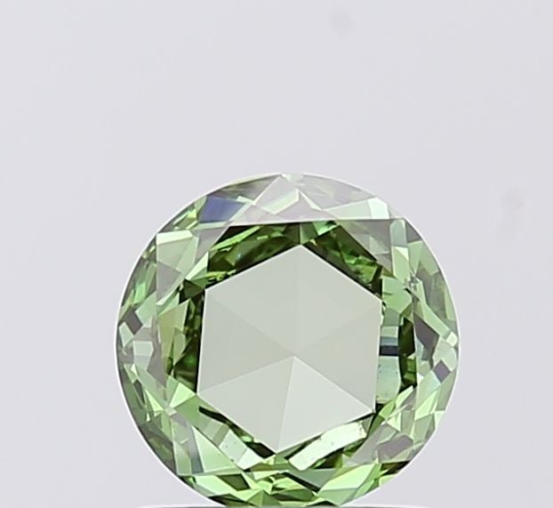Loose Diamond - ROUND 0.91ct Fancy Vivid Green VS1: Loose Diamond - ROUND 0.91ct Fancy Vivid Green VS1 Source: This is a real non-mined Diamond that has been grown in a lab Shape: ROUND Carats: 0.91 Color: Fancy Vivid Green Certification: IGI Video: