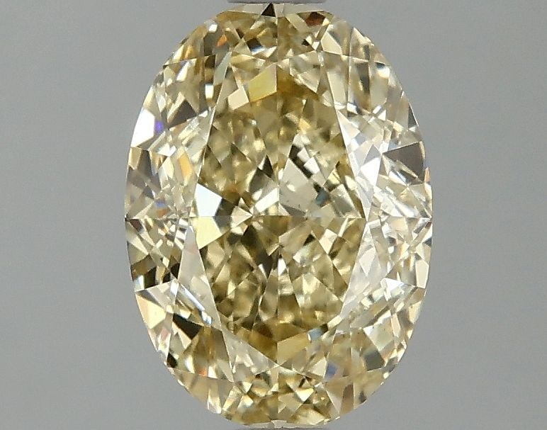 Loose Diamond - OVAL 2.1ct Fancy Intense Yellow VS1: Loose Diamond - OVAL 2.1ct Fancy Intense Yellow VS1 Source: This is a real non-mined Diamond that has been grown in a lab Shape: OVAL Carats: 2.1 Color: Fancy Intense Yellow Certification: IGI Video: