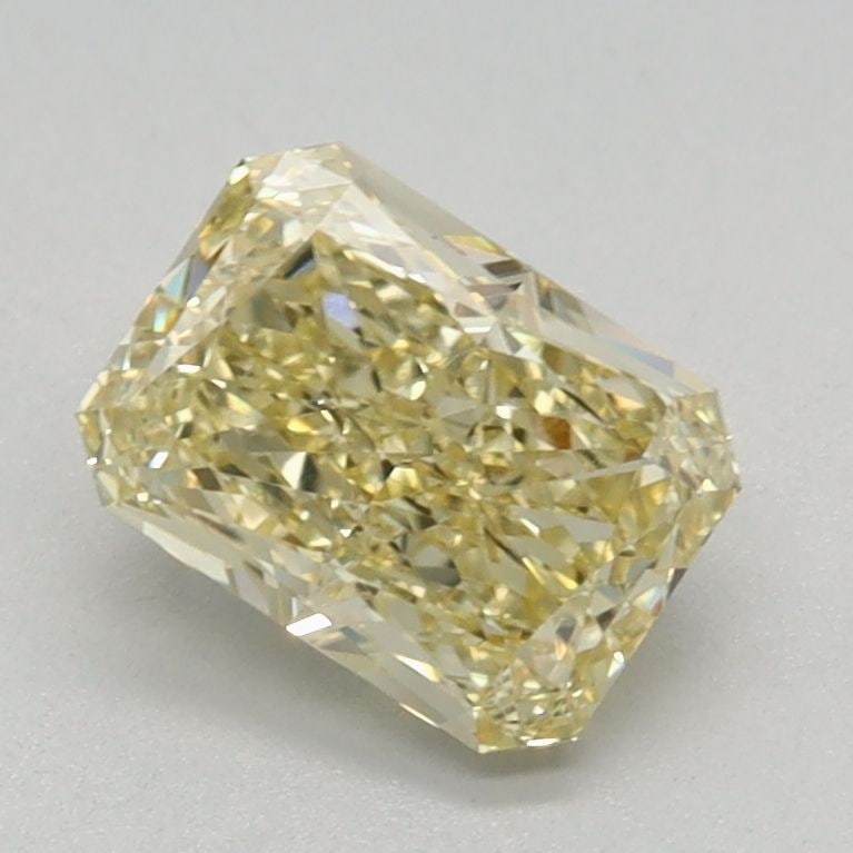 Loose Diamond - RADIANT 0.91ct Fancy Yellow VS1: Loose Diamond - RADIANT 0.91ct Fancy Yellow VS1 Source: This is a real non-mined Diamond that has been grown in a lab Shape: RADIANT Carats: 0.91 Color: Fancy Yellow Certification: IGI Video: