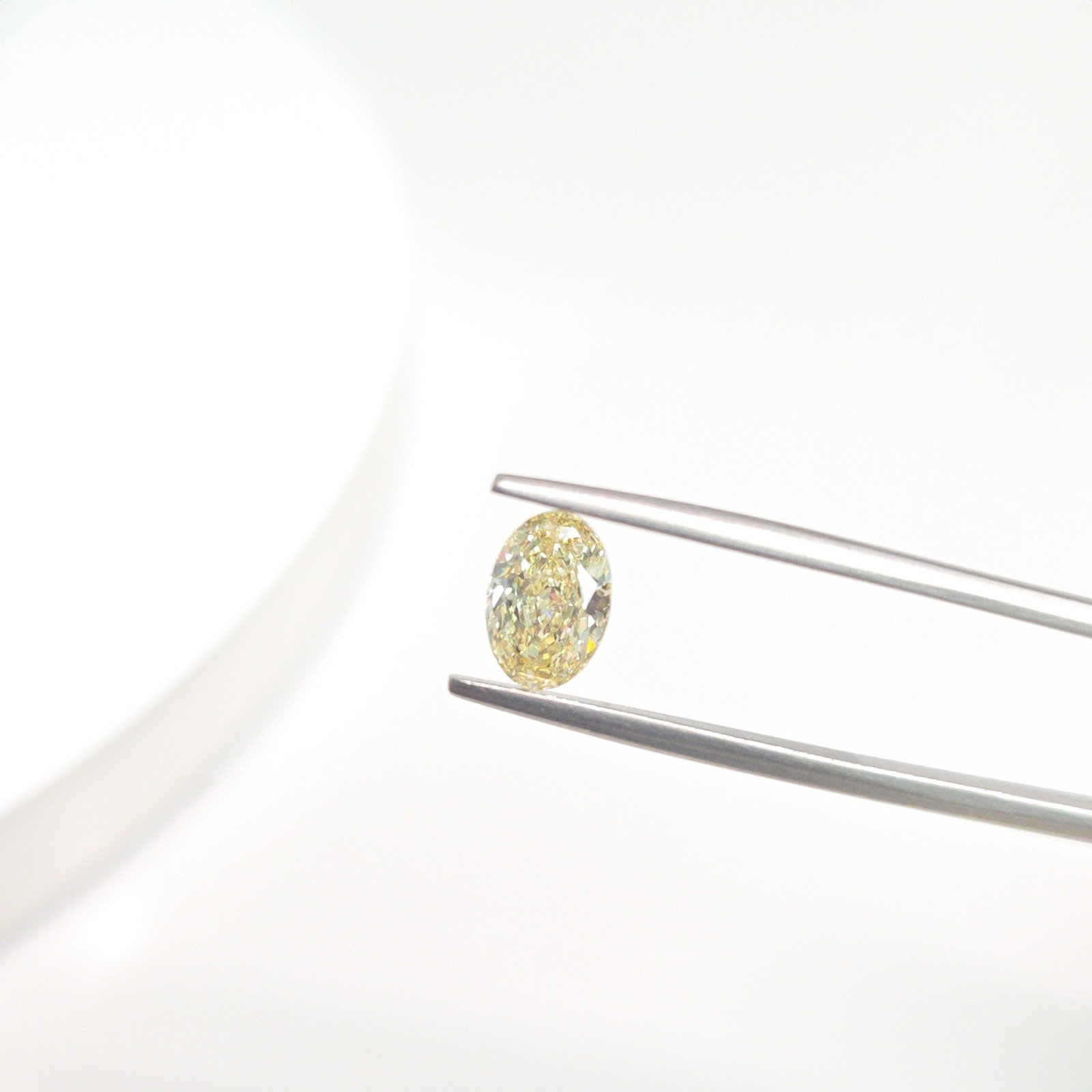 Loose Diamond - OVAL 1.04ct Fancy Light Yellow VVS2: Loose Diamond - OVAL 1.04ct Fancy Light Yellow VVS2 Source: This is a real non-mined Diamond that has been grown in a lab Shape: OVAL Carats: 1.04 Color: Fancy Light Yellow Certification: IGI Video: